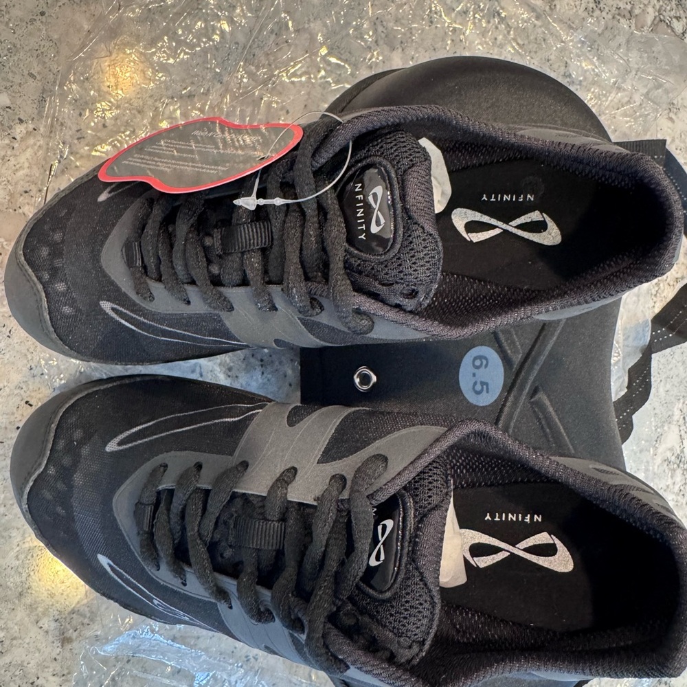 NFINITY Black cheer Shoes Sleek Design Performance-Oriented